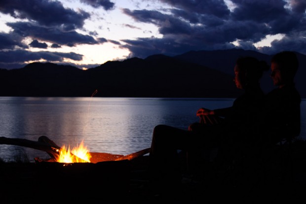 Campfire on a remote lake in the Canadian wilderness